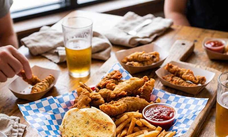 Classic Idaho finger steaks in a basket with fries
